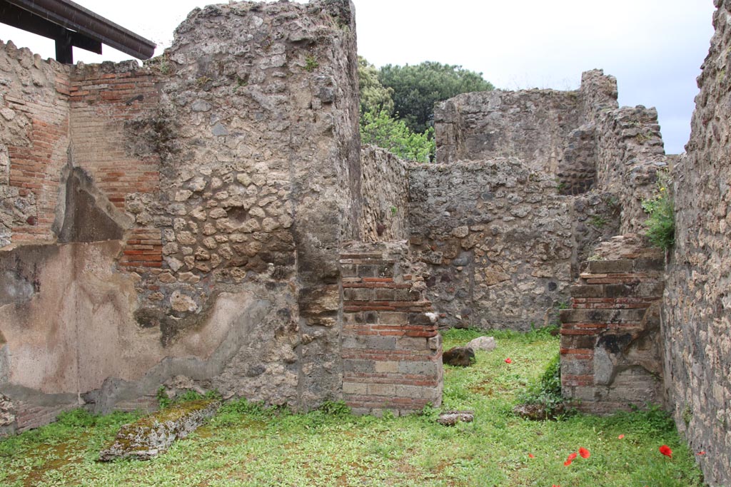VIII.3.7 Pompeii. May 2024. 
Looking towards doorway to rear room in south wall of shop-room. Photo courtesy of Klaus Heese.