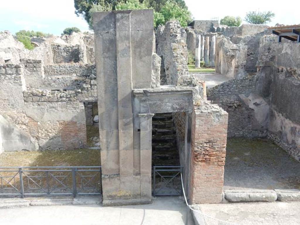 VIII.3.11 Pompeii, on left, VIII.3.10 (centre) and VIII.3.9, on right. May 2015. 
Entrance doorway taken across Via dell’Abbondanza. Photo courtesy of Buzz Ferebee.