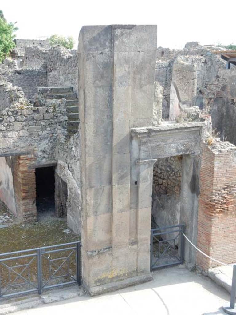 VIII.3.11 Pompeii, on left and VIII.3.10, on right. May 2015. Entrance doorway showing steps to upper floors at rear. 
Photo courtesy of Buzz Ferebee.