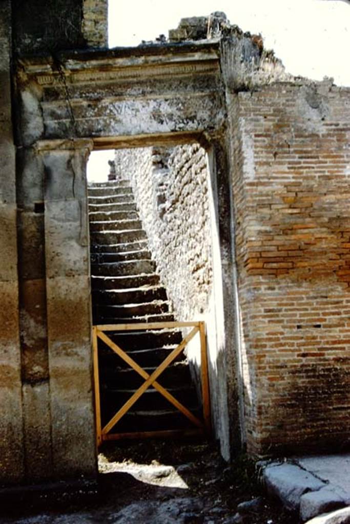 VIII.3.10 Pompeii. 1961. Entrance to the steps to the upper floor.    Photo by Stanley A. Jashemski.
Source: The Wilhelmina and Stanley A. Jashemski archive in the University of Maryland Library, Special Collections (See collection page) and made available under the Creative Commons Attribution-Non Commercial License v.4. See Licence and use details.
J61f0794
