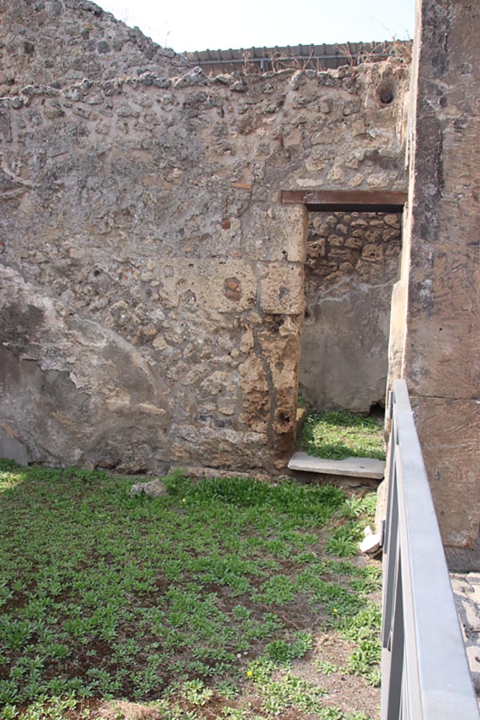 VIII.3.11 Pompeii. October 2023. 
Doorway in west wall in north-west corner, linking workshop to stairs in VIII.3.10.
Photo courtesy of Klaus Heese.