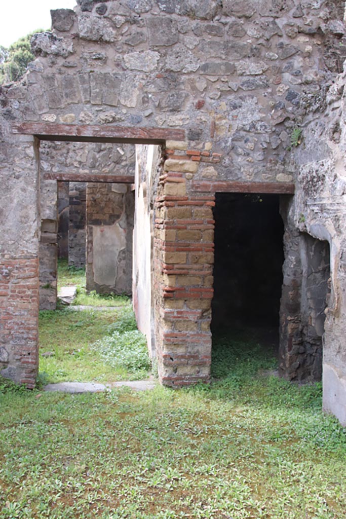 VIII.3.11 Pompeii. May 2024. South-west corner, with doorway leading to VIII.3.12, centre left.
Doorway to a cubiculum and storeroom, on right. Photo courtesy of Klaus Heese.