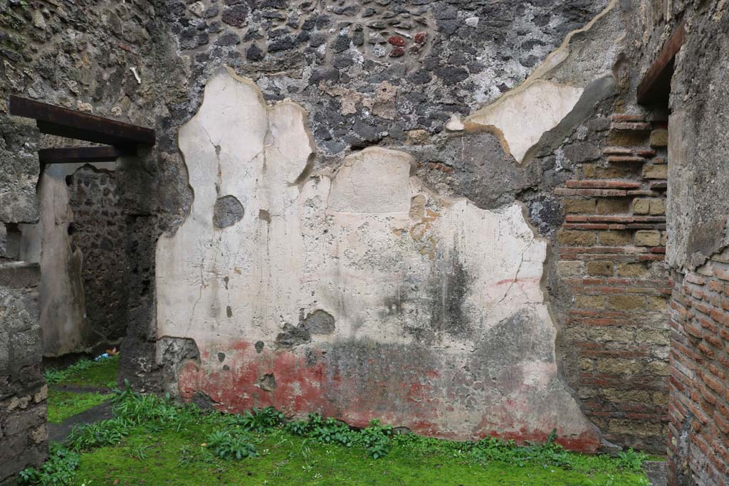 VIII.3.12 Pompeii. December 2018. 
Looking towards west wall of triclinium, on the left is the doorway to atrium/courtyard, and doorway into VIII.3.11, on right.
Photo courtesy of Aude Durand.