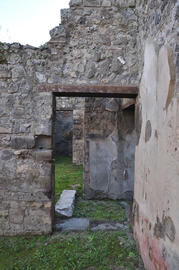 VIII.3.12 Pompeii. January 2024. 
Doorway in south-west corner of triclinium, leading into atrium/yard. Photo courtesy of Domenico Esposito.