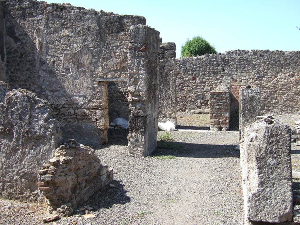 VIII.3.14 Pompeii. September 2005. Looking west across south side of atrium. On the left would be the oecus, ala, and then doorway to triclinium.  According to Helbig, in the left ala would have been paintings of uncertain local deities (no.965), Busts (nos.557 and 1421f) and a wall painting of Perseus and Andromeda (no.1191)
See Helbig, W., 1868. Wandgemälde der vom Vesuv verschütteten Städte Campaniens. Leipzig: Breitkopf und Härtel. (nos.965,557, 1421f and 1191)
.