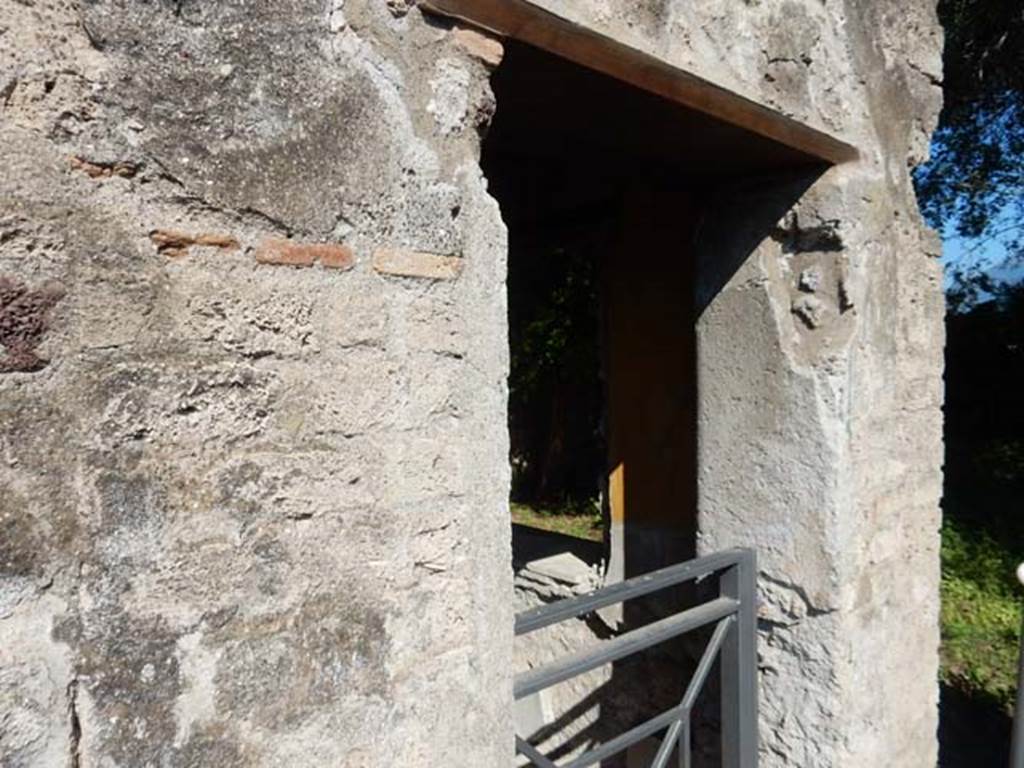 VIII.3.14 Pompeii. May 2016. Doorway to cubiculum. Photo courtesy of Buzz Ferebee.
According to Helbig, wall paintings found in this room (Erstes Zimmer von recht hinter dem Atrium) included -
Apollo, Chiron & Asclepius (Aesculapius), (Helbig no 202), now in Naples Archaeological Museum.
Crowning of a woman, (Helbig 1412), now in Naples Archaeological Museum.
Paintings of cupids, (Helbig 802, 803). 
See Helbig, W., 1868. Wandgemälde der vom Vesuv verschütteten Städte Campaniens. Leipzig: Breitkopf und Härtel. (nos. 202, 1412, 802 and 803).
(Note: the paintings of Apollo, Chiron & Asclepius (Aesculapius), (Helbig no 202), Naples Inventory number 8846; and Crowning of a woman, (Helbig 1412), Naples Inventory number 9127; have also both been entered into VI.17.10, as their provenance for which area they were found in, seems to be in dispute).