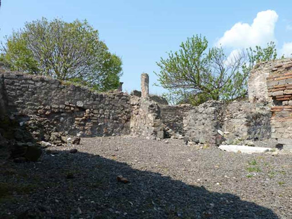 VIII.3.15 Pompeii. May 2010. Looking west from entrance. 
On the left would have been the stairs to upper floor, latrine and with a hearth at rear.
In the centre, the doorway to the triclinium can be seen. On the right can be seen the entrance to the corridor to the garden area.
