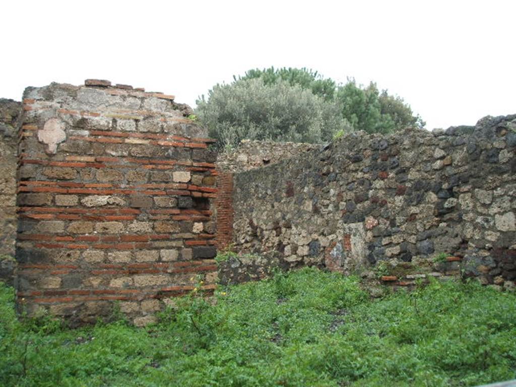 VIII.3.15 Pompeii. December 2004. Looking north-east from entrance doorway, towards garden area.
This would have been the doorway in the north wall of room 9 leading onto south portico 8.