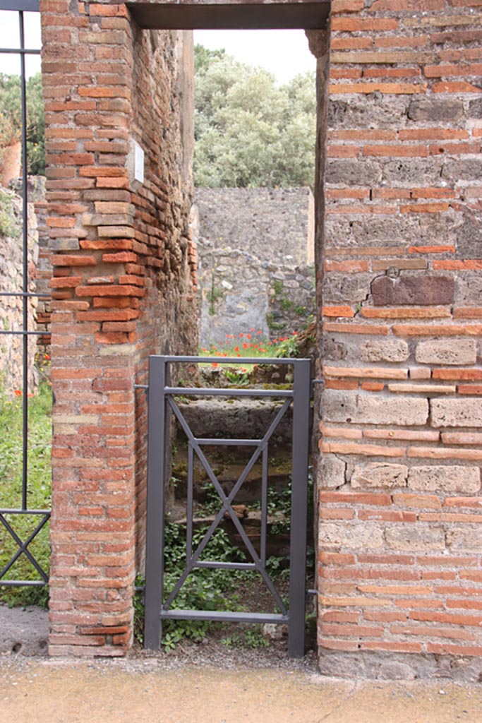VIII.3.20 Pompeii. May 2024. 
Looking east from Via delle Scuole towards steps to upper floor. Photo courtesy of Klaus Heese.