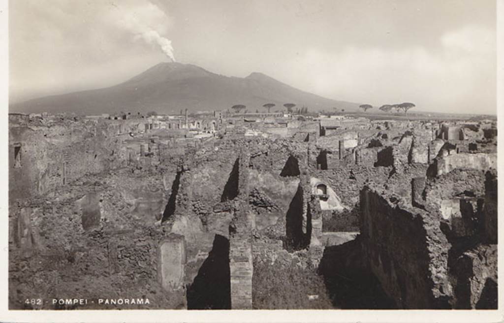 VIII.3.21 Pompeii. Postcard dated 1st August 1939. Looking north across VIII.3. VIII.3.21 can be seen at the front of the picture. 
This shows the corridor that runs west to east from the entrance and in the centre is the doorway to the kitchen, followed by the cubiculum.
The arched niche described by Boyce, and the north wall of the garden, can be seen to the right in the centre of the photo.
Photo courtesy of Drew Baker.