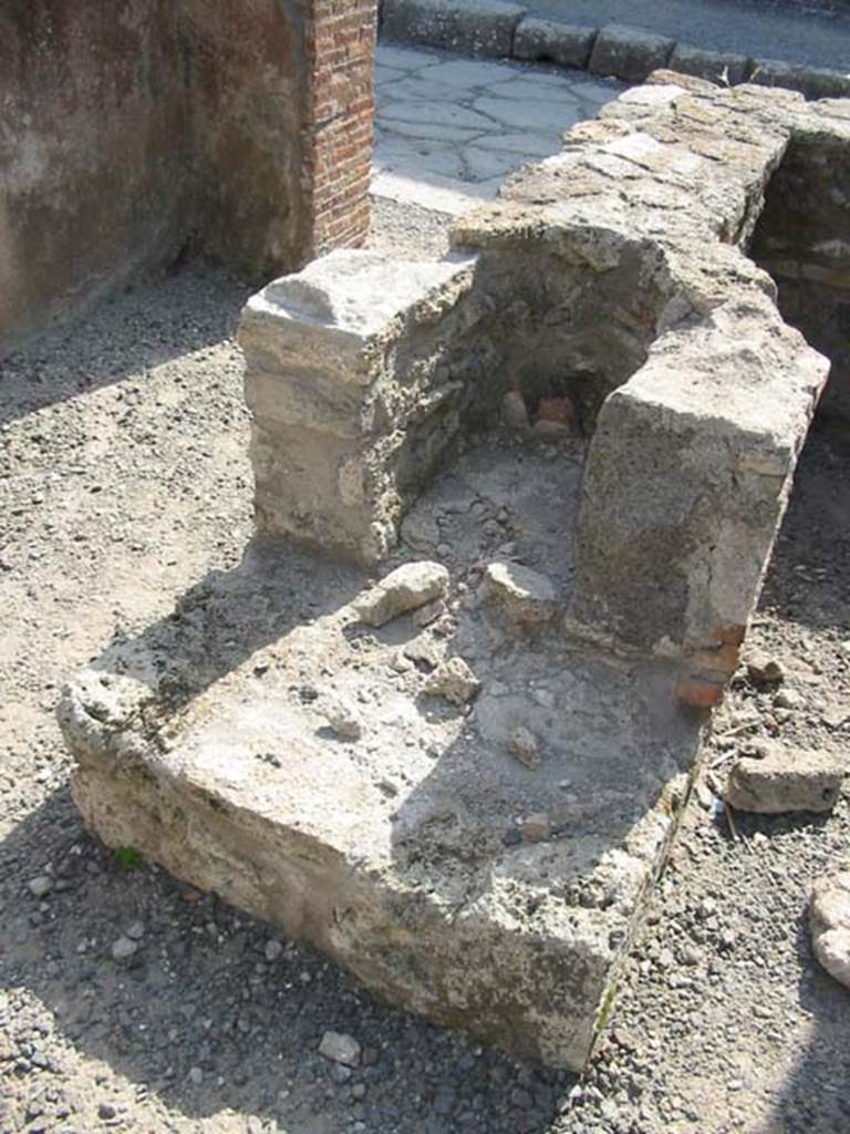 VIII.3.22 Pompeii. May 2003. Hearth at east end of counter. Photo courtesy of Nicolas Monteix.