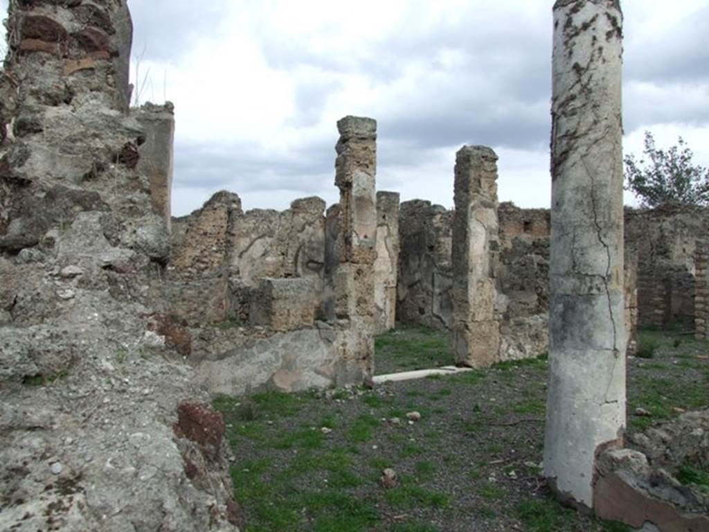 VIII.3.24 Pompeii. December 2007. Looking north across peristyle towards doorway to large room, leading to other rooms.