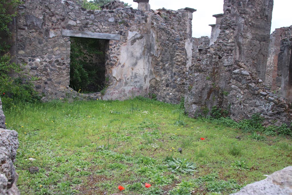 VIII.3.28 Pompeii. May 2024. 
Looking south-east across the site of the rear room towards the portico of VIII.3.27, on right. Photo courtesy of Klaus Heese.