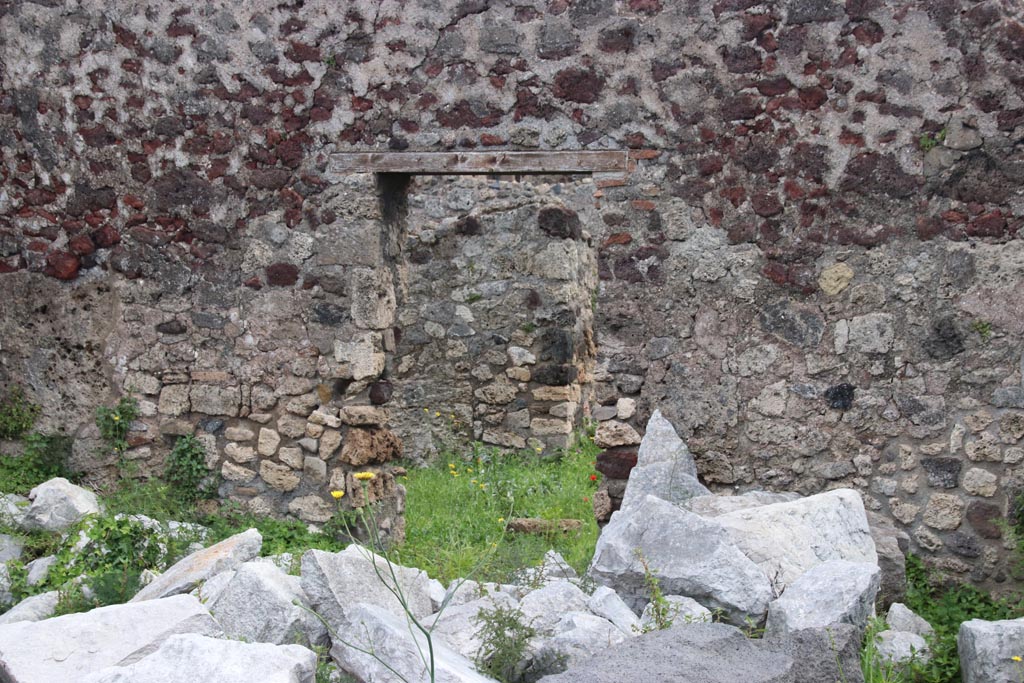 VIII.3.31 Pompeii. May 2024. Doorway in east wall of oecus. Photo taken across the wall of VIII.3.29. Photo courtesy of Klaus Heese.