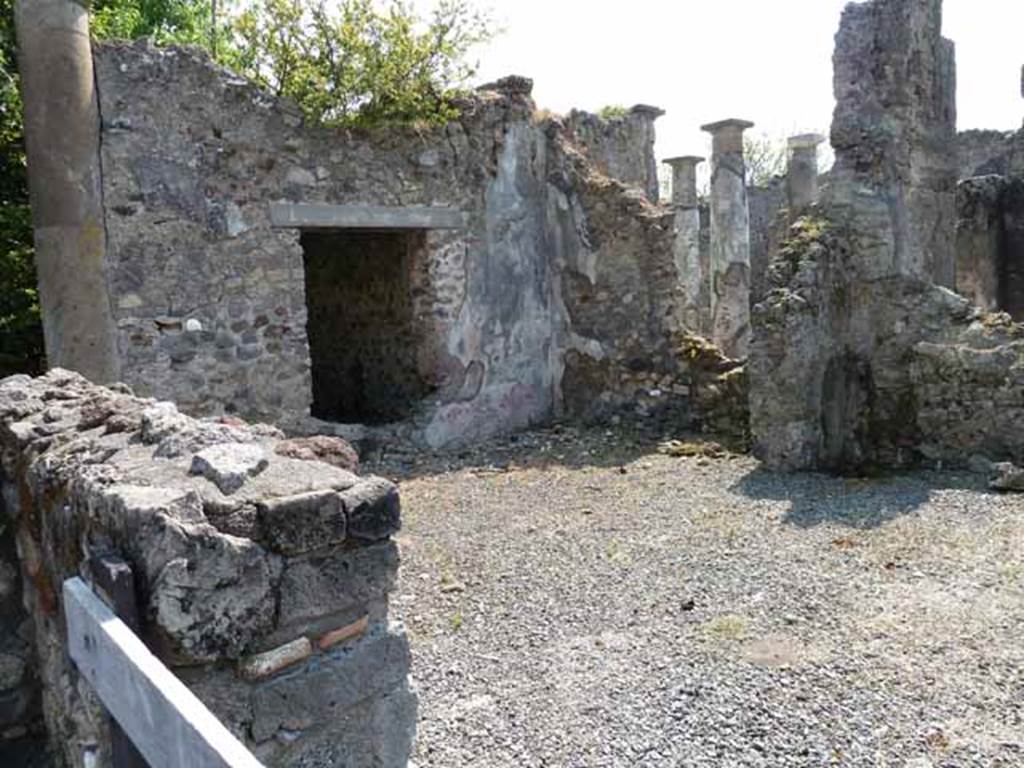 VIII.3.31 Pompeii. May 2010. Looking east across the site of the rear room of VIII.3.28, towards the west portico. Taken from VIII.3.28 near the doorway into the rear room.