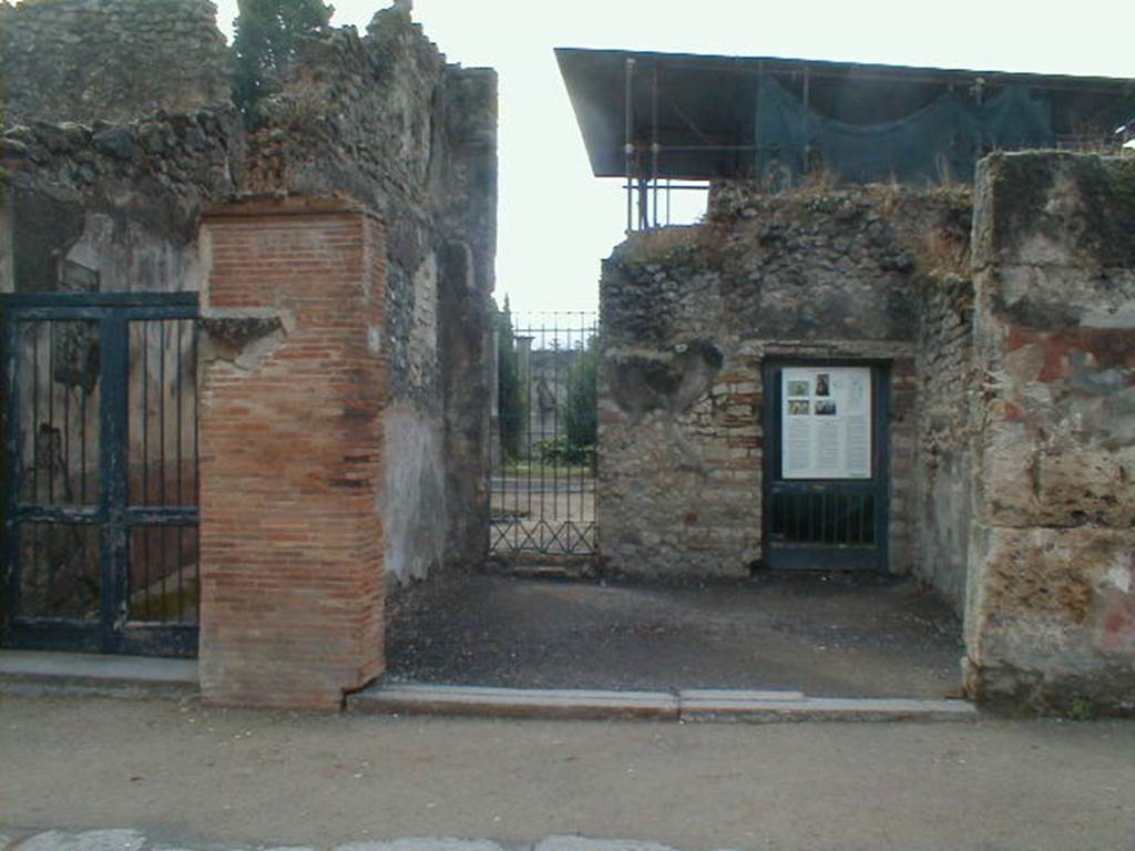 VIII.4.3 Pompeii. September 2004. Looking south to entrance of shop, with doorway to atrium of VIII.4.4 in the south wall.