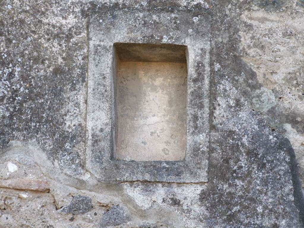 VIII.4.5 Pompeii. December 2006. Niche in south wall of shop. Boyce described this niche as a small rectangular niche adorned with an aedicula façade. 
See Boyce G. K., 1937. Corpus of the Lararia of Pompeii. Rome: MAAR 14. (p.76)