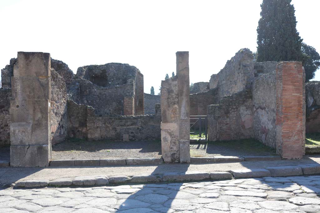 VIII.4.13, Pompeii, on left. December 2018. 
Looking south to entrance doorways, with VIII.4.12, on right. Photo courtesy of Aude Durand.