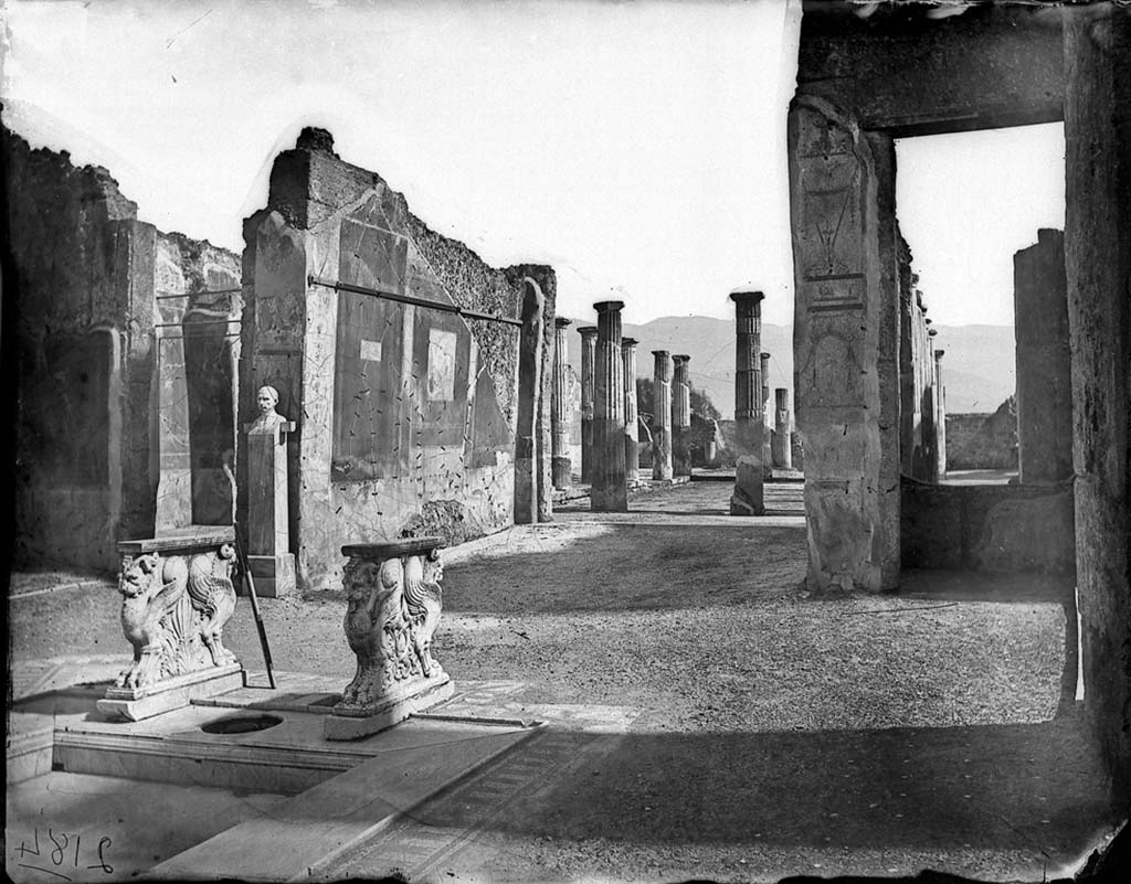 VIII.4.15 Pompeii. 1871. Looking south across impluvium towards decorated east wall of tablinum.
Photo by J. H. Parker, © American Academy in Rome. Parker.2184.Italia.