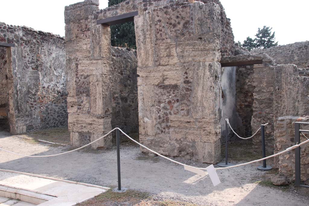 VIII.4.15 Pompeii. September 2021.
Looking south-west across atrium towards rooms 8, 9, and 10 on west side of atrium. Photo courtesy of Klaus Heese.