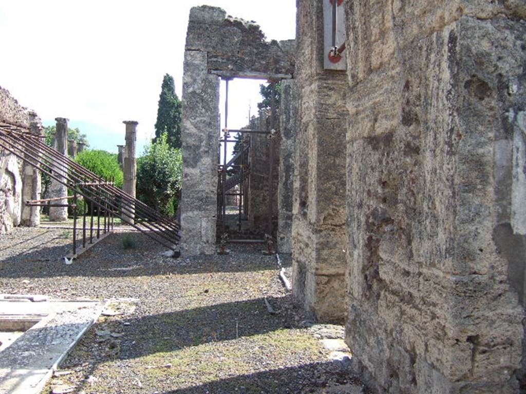 VIII.4.15 Pompeii. September 2005. Looking south along west side of atrium.