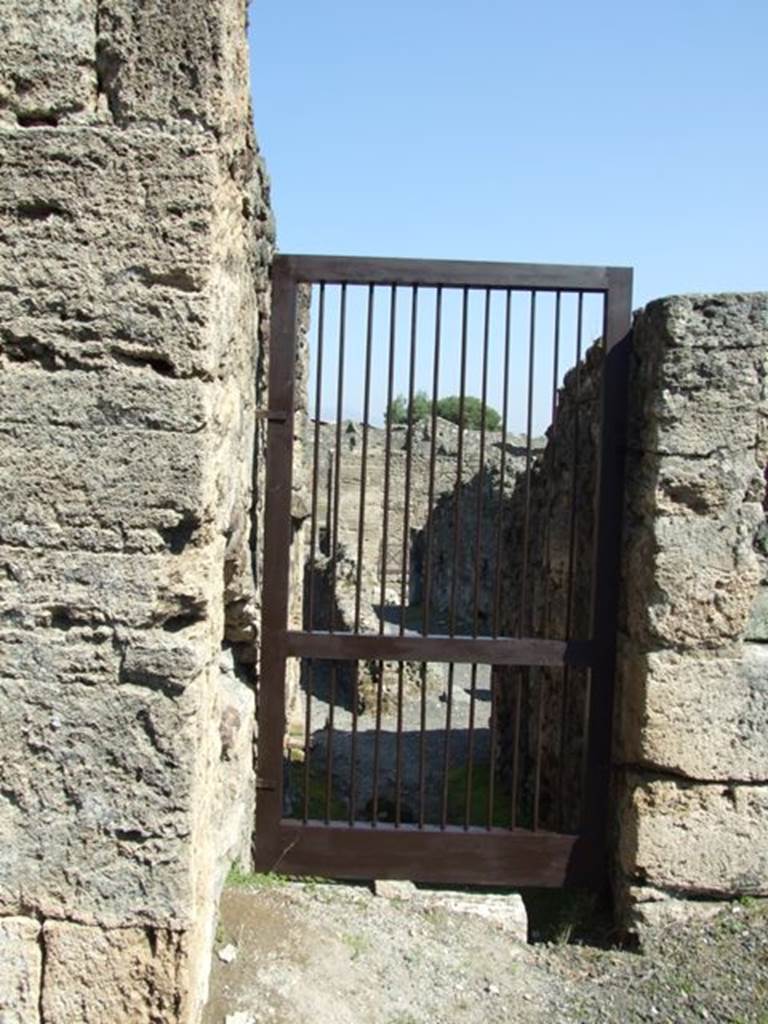 VIII.4.15 Pompeii. March 2009.  Doorway to VIII.4.23, and Via Stabiana.  Looking east.