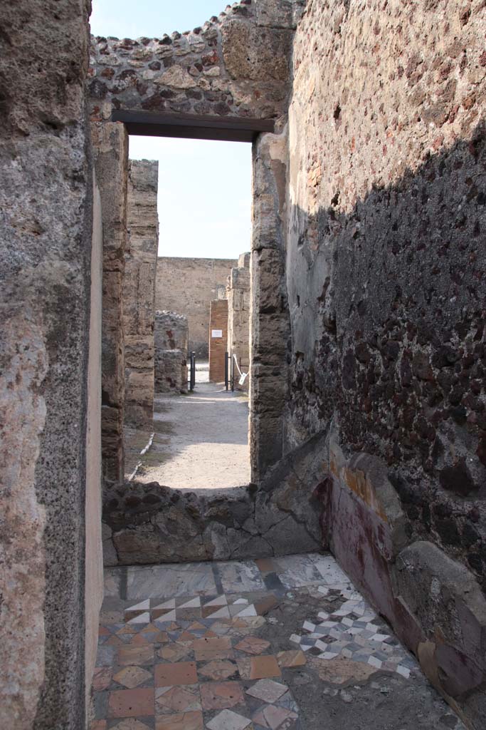 VIII.4.15 Pompeii. September 2021.  
Room 18, looking north towards room 7 and atrium from cubiculum, with Opus sectile floor.  
Photo courtesy of Klaus Heese.