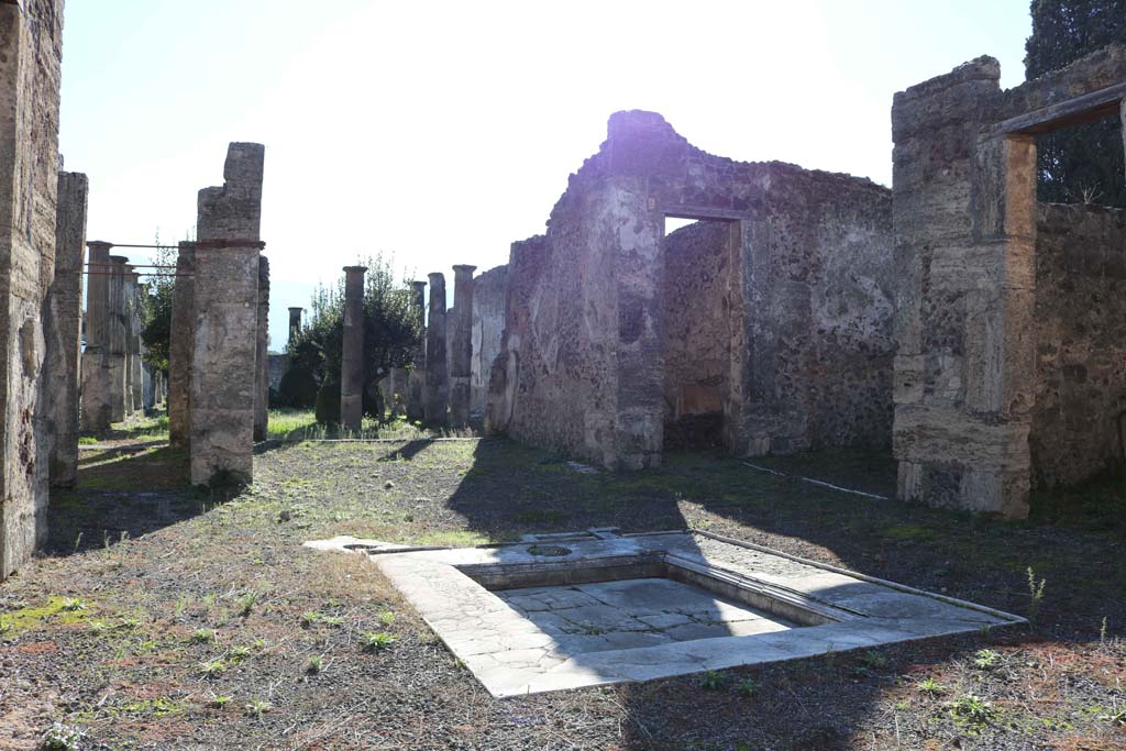 VIII.4.15 Pompeii December 2018. 
Looking south-west across impluvium in atrium, towards tablinum and through to peristyle. Photo courtesy of Aude Durand.