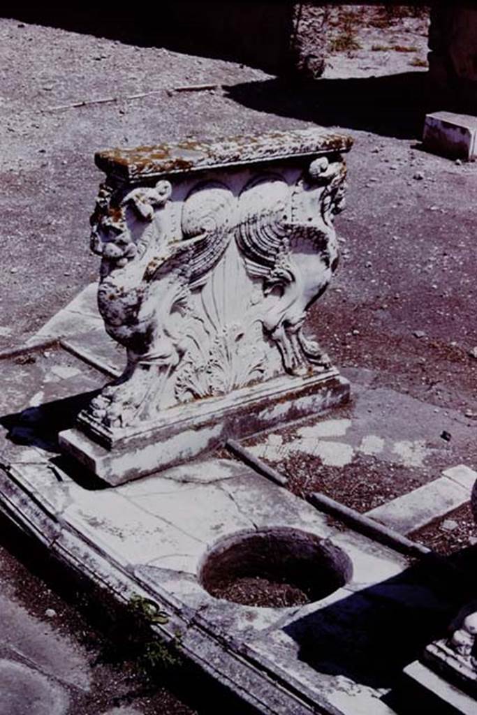 VIII.4.15 Pompeii. 1966. One of the table supports, and circular opening. Photo by Stanley A. Jashemski.
Source: The Wilhelmina and Stanley A. Jashemski archive in the University of Maryland Library, Special Collections (See collection page) and made available under the Creative Commons Attribution-Non Commercial License v.4. See Licence and use details.
J66f0573