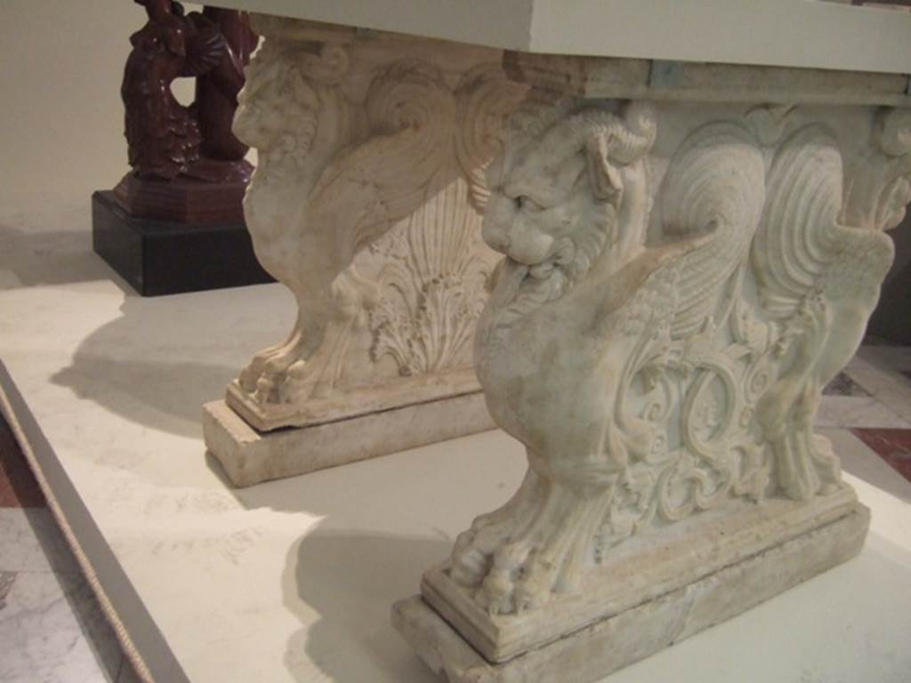 VIII.4.15 Pompeii.  December 2007.  Supports of marble table or cartibulum.  Now in Naples Archaeological Museum.