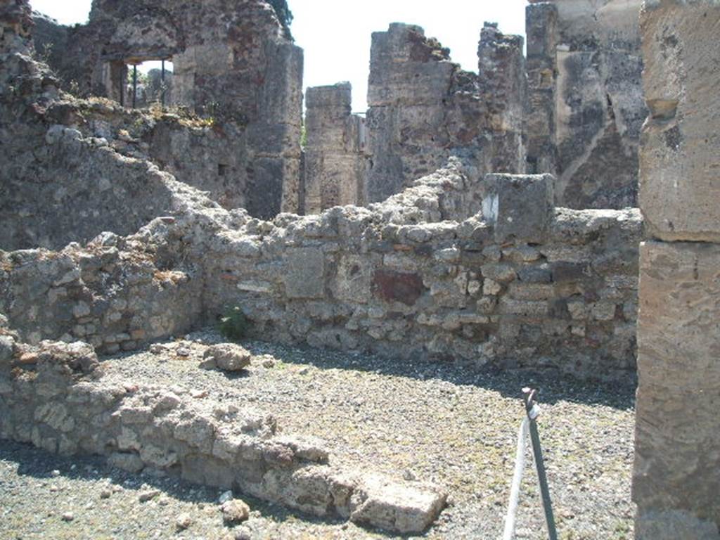 VIII.4.17 Pompeii. May 2005. Rear room in foreground, VIII.4.15 in background.