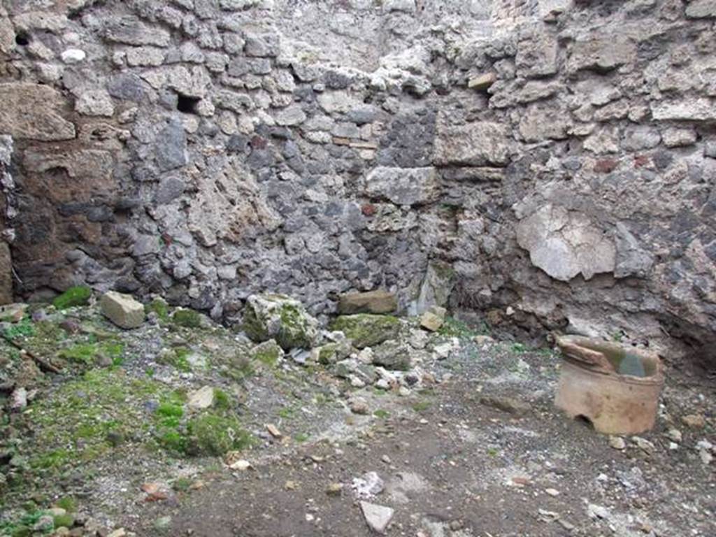 VIII.4.25 Pompeii. December 2007. Looking across rear room towards the north-west corner.
Remains of a terracotta puteal, are on the right.