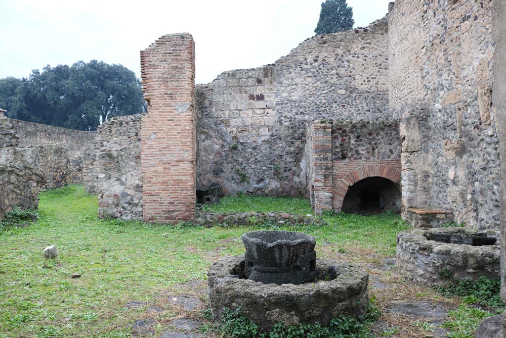 VIII.4.27 Pompeii. December 2018. 
Looking west across bakery, with doorway to rear rooms, on left. Photo courtesy of Aude Durand.