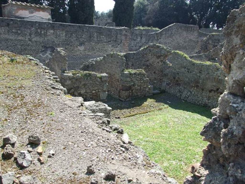 VIII.4.30 Pompeii. March 2009. Looking south from upper level of VIII.4.15, to rooms on south side. According to Jashemski, Fiorelli thought this was originally a porticoed garden belonging to house VIII.4.15. Then it became a separate house with a small atrium and adjoining rooms.
See Jashemski, W. F., 1993. The Gardens of Pompeii, Volume II: Appendices. New York: Caratzas. (p.214)
See Pappalardo, U., 2001. La Descrizione di Pompei per Giuseppe Fiorelli (1875). Napoli: Massa Editore. (p.129-30)