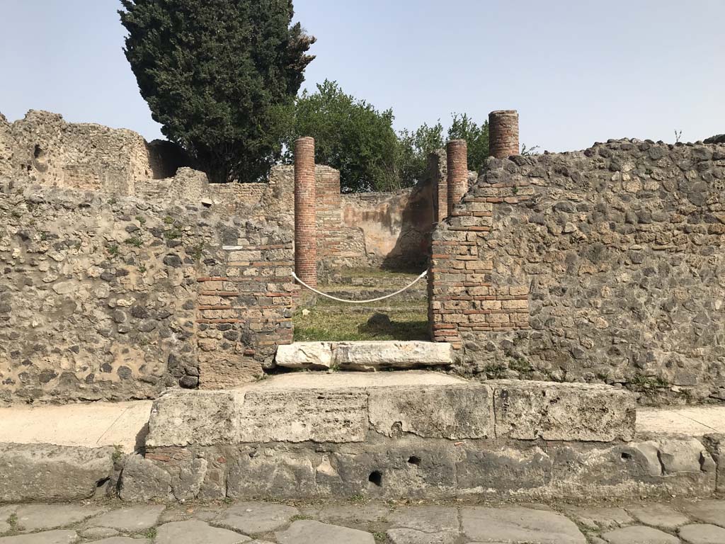 VIII.4.34 Pompeii, April 2019. Entrance doorway on raised ramp in pavement.
Photo courtesy of Rick Bauer.