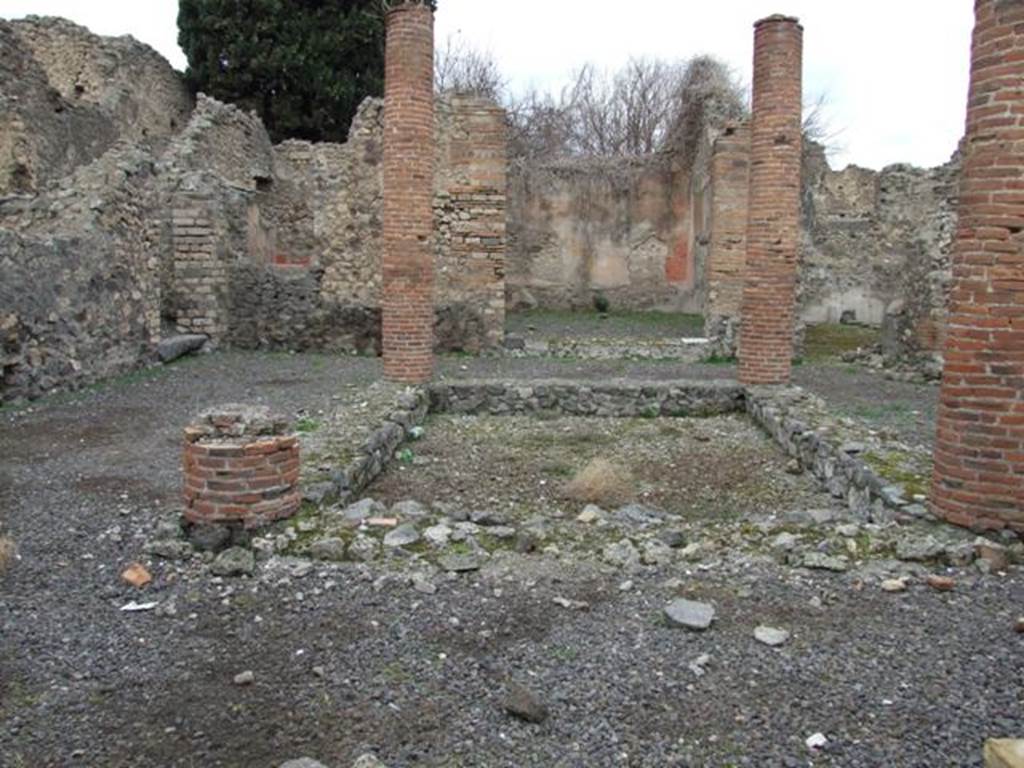 VIII.4.34 Pompeii. December 2007. Looking north across tetrastyle atrium. The tablinum is at the rear. According to Breton, in the tablinum were two well preserved wall paintings, to the right Hercules and Omphale, to the left an unidentified subject. Helbig agreed.
See Breton, Ernest. 1870. Pompeia, Guide de visite a Pompei, 3rd ed. Paris, Guerin. 
See Helbig, W., 1868. Wandgemälde der vom Vesuv verschütteten Städte Campaniens. Leipzig: Breitkopf und Härtel. (1136 and 971)