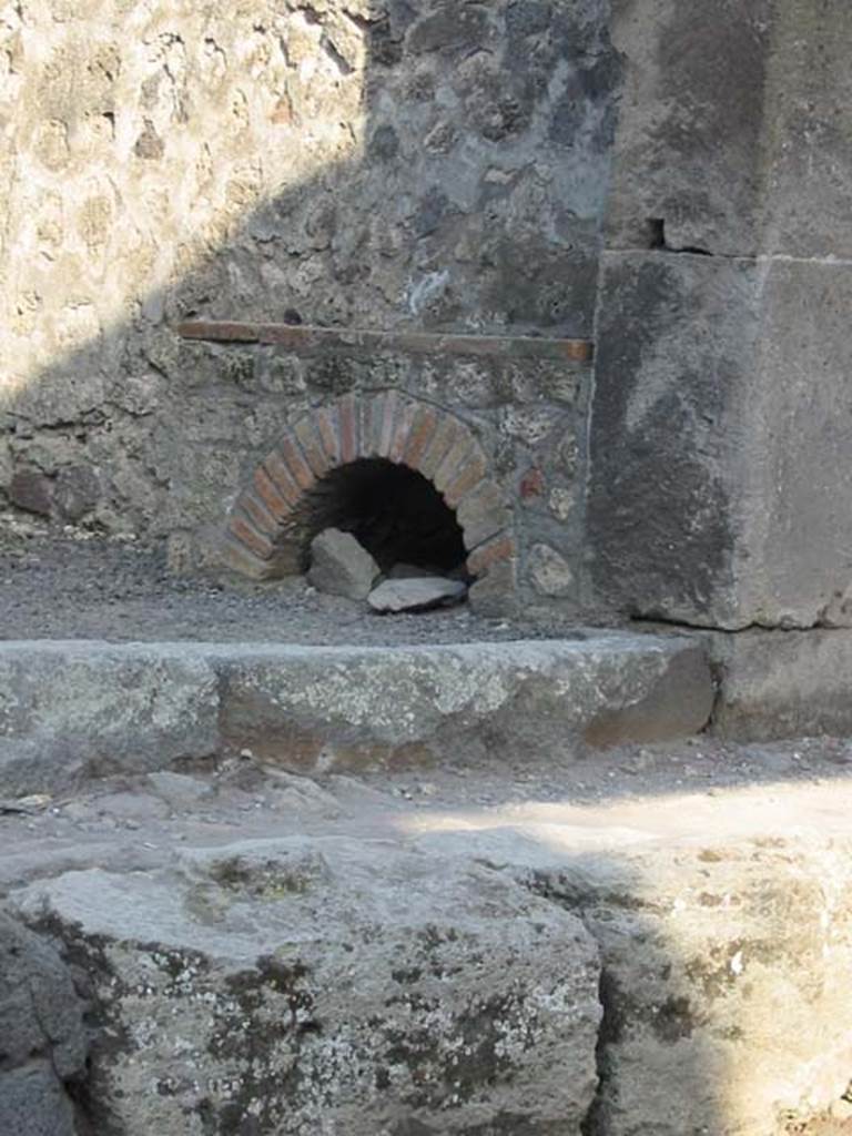 VIII.4.47 Pompeii. May 2003. Hearth against the south wall at the front, in the south-west corner, near entrance. Photo courtesy of Nicolas Monteix.