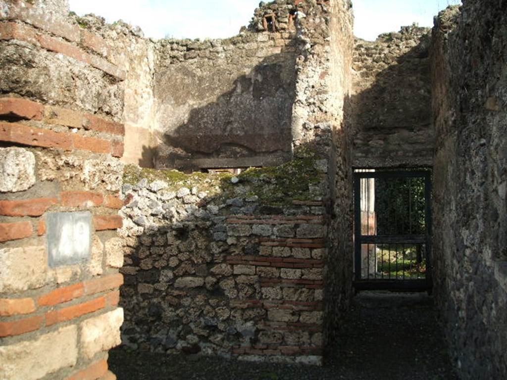 VIII.4.49 Pompeii. December 2004. Looking east to corridor leading to doorway to VIII.4.4.