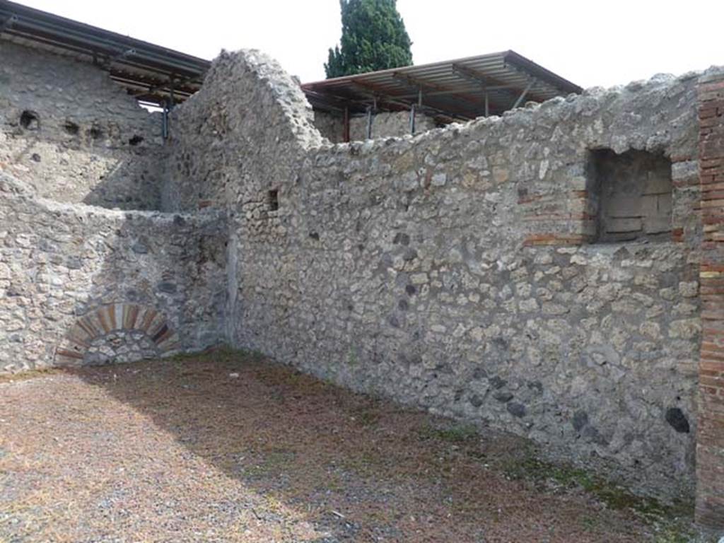 VIII.4.51 Pompeii. September 2015. East and south wall, looking towards south-east corner of shop-room.