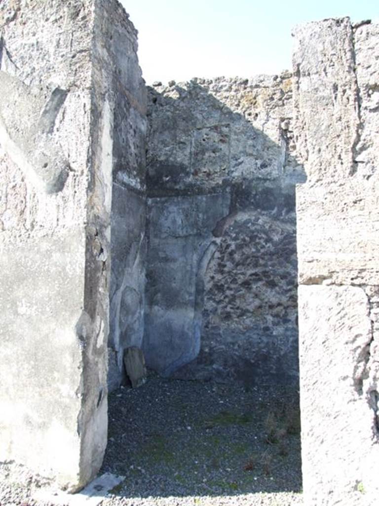 VIII.5.2 Pompeii. March 2009. Doorway to room 3, room with remains of stairs and cupboard.  According to Fiorelli, a cubiculum. Accoding to Eschebach, a staircase room with apotheca. 
See Pappalardo, U., 2001. La Descrizione di Pompei per Giuseppe Fiorelli (1875). Napoli: Massa Editore. (p.163)
See Eschebach, L., 1993. Gebäudeverzeichnis und Stadtplan der antiken Stadt Pompeji. Köln: Böhlau. )p.379)