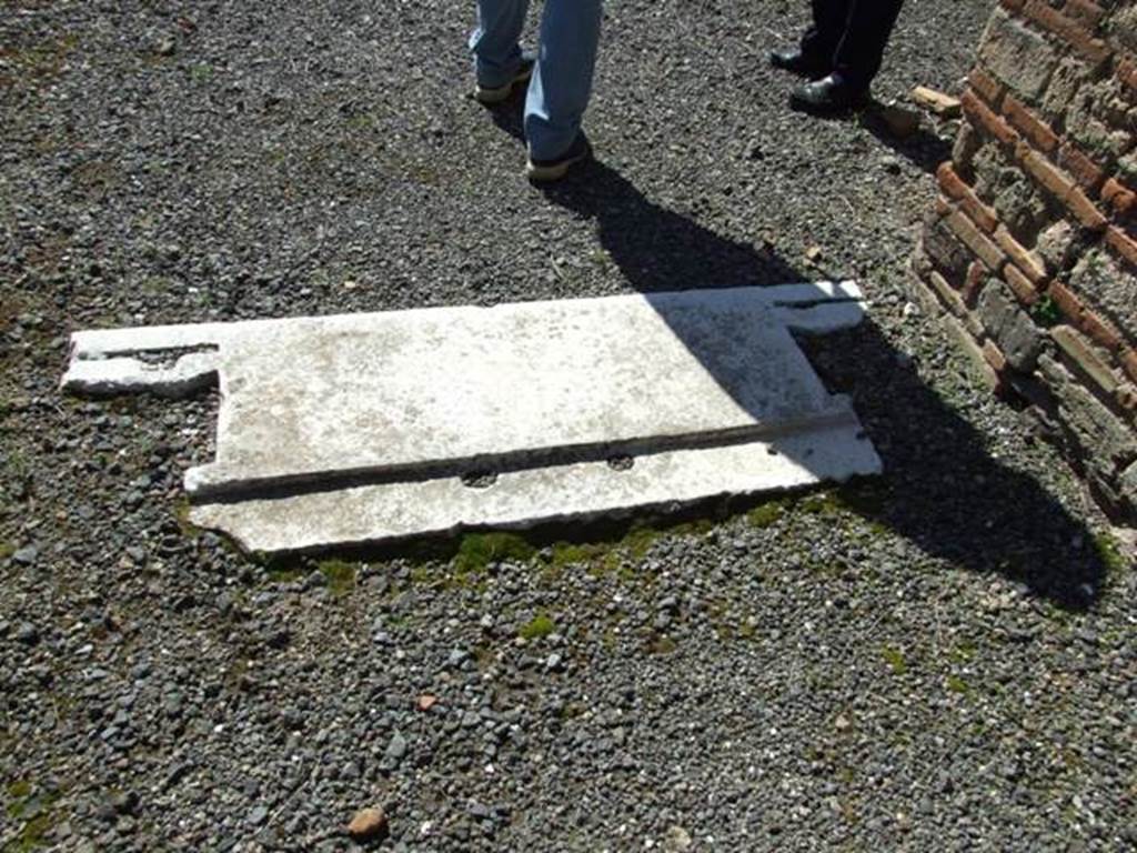 VIII.5.9 Pompeii.  March 2009.  Marble sill at end of entrance corridor, leading to Room 1, Atrium