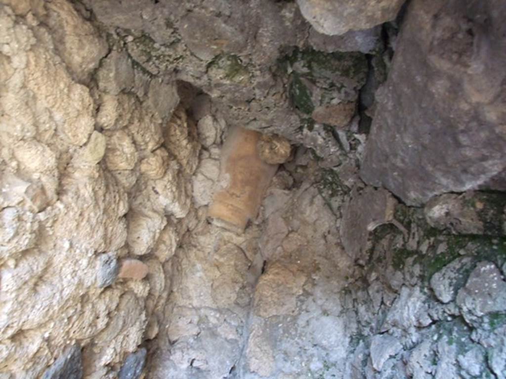 VIII.5.15 Pompeii. March 2009. Room 1, north wall of latrine with downpipe, under stairs.