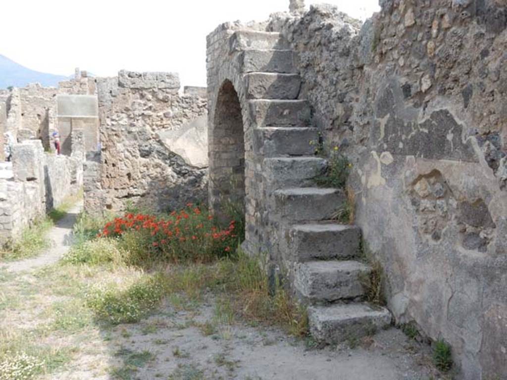 VIII.5.17 Pompeii. May 2017. Recess with stairs to upper floor. Looking north along east wall. Photo courtesy of Buzz Ferebee.