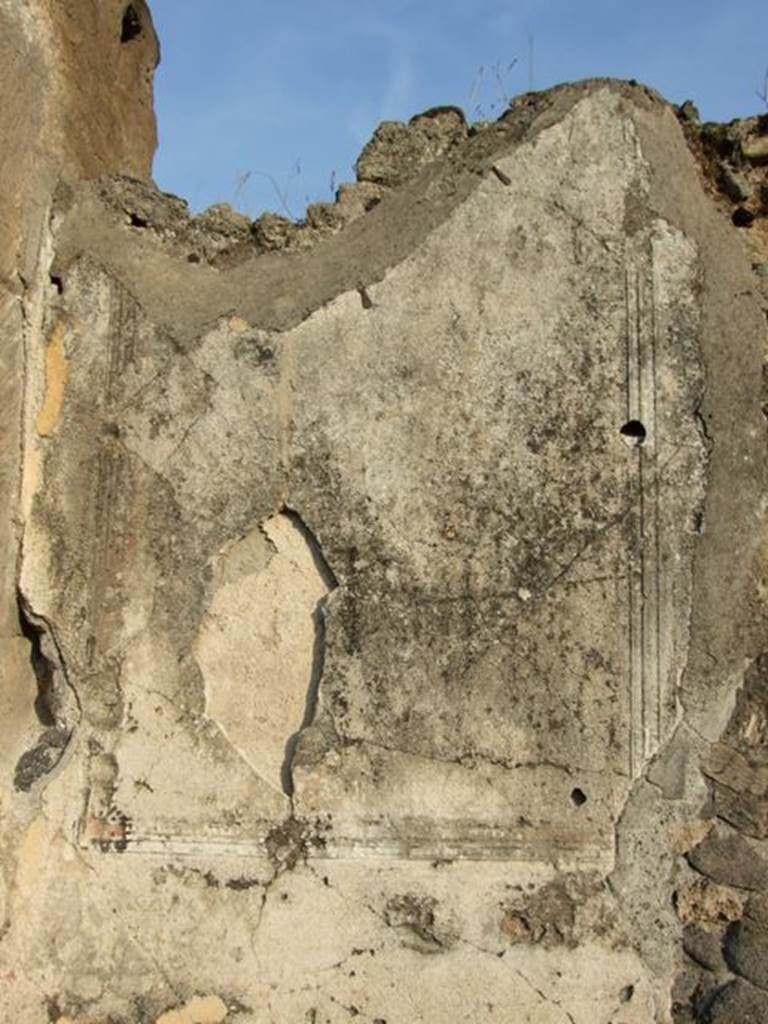 VIII.5.20 Pompeii. December 2007. East wall.  Detail of plaster panel on wall.