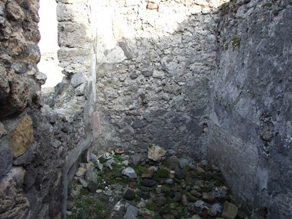 VIII.5.21 Pompeii. December 2007. 
Small room, probably including stairs and with latrine below them, at the end of the corridor on south side. Looking east.