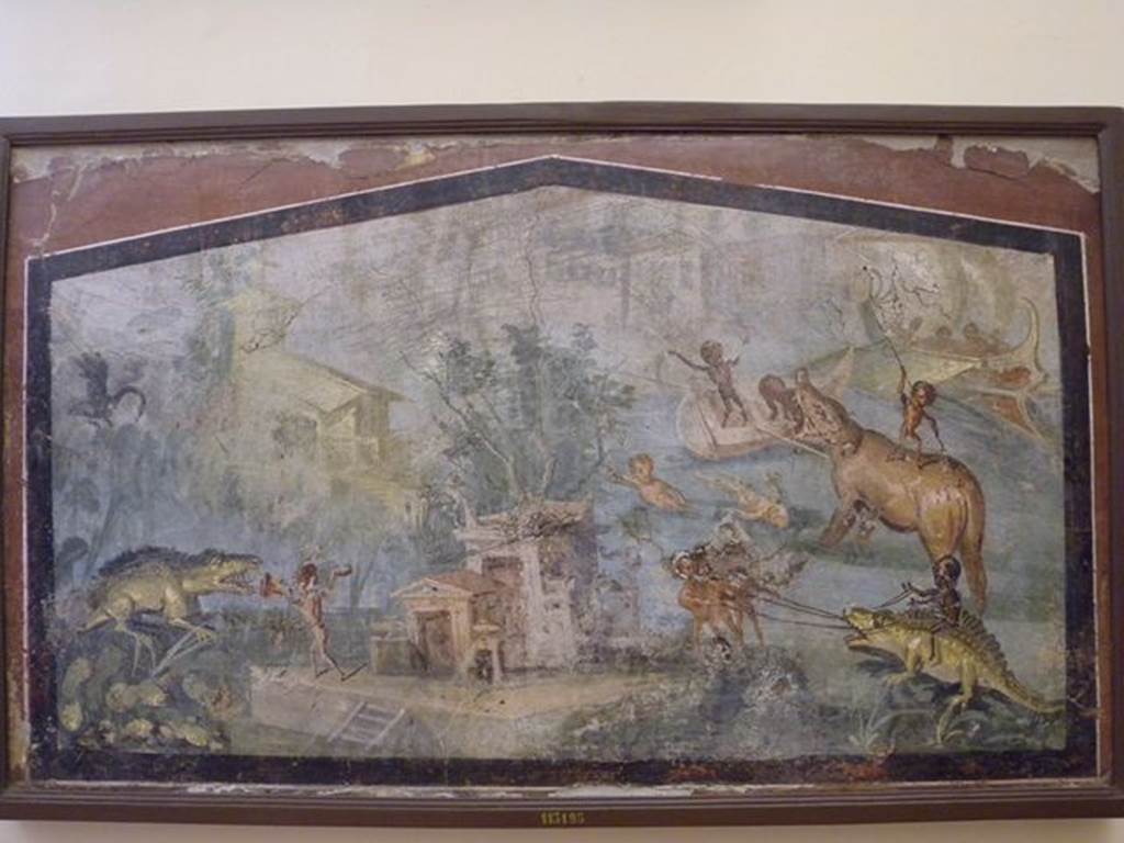 VIII.5.24 Pompeii. Wall painting of Pygmies in a Nile Scene. From a low wall connecting peristyle columns in VIII.5.24.  
Now in Naples Archaeological Museum. Inventory number 113195.