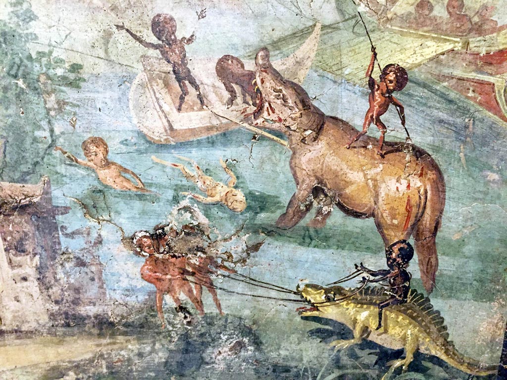 VIII.5.24 Pompeii. 
Detail from a wall painting of Pygmies in a Nile Scene. Found in 1882 from a low wall connecting peristyle columns in VIII.5.24.  
Now in Naples Archaeological Museum. Inventory number 113195.
Photo courtesy of Giuseppe Ciaramella taken December 2019.