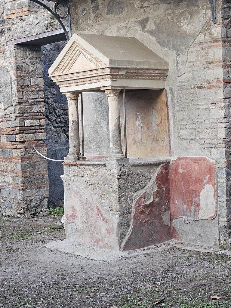 VIII.5.37 Pompeii. November 2024.
Room 1, aedicula lararium against east wall in atrium. Photo courtesy of Annette Haug.
