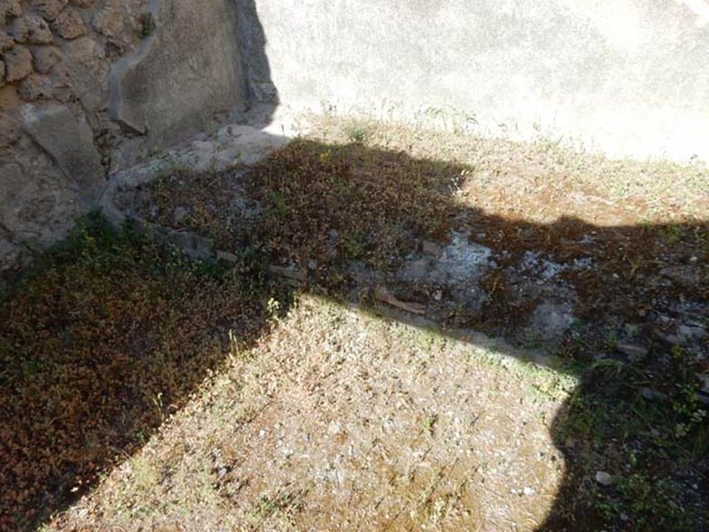 VIII.5.37 Pompeii. May 2017. Room 5, ala, east end with masonry podium. Photo courtesy of Buzz Ferebee.