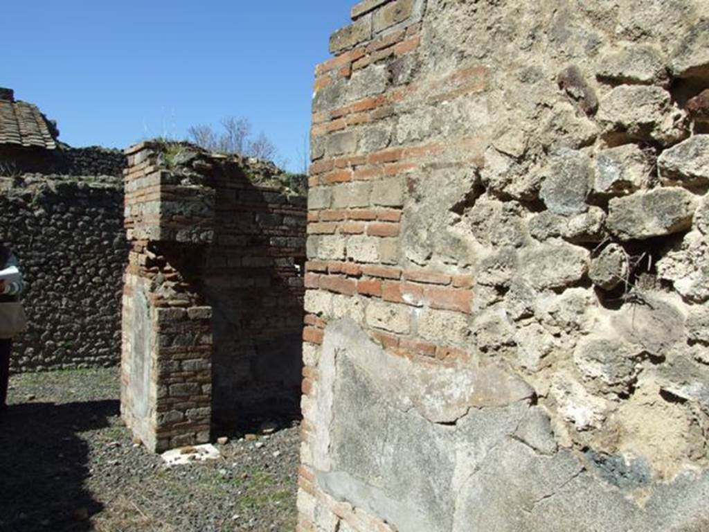 VIII.5.37 Pompeii. March 2009. Room 6, north wall of corridor. Looking west to doorway to room 8.